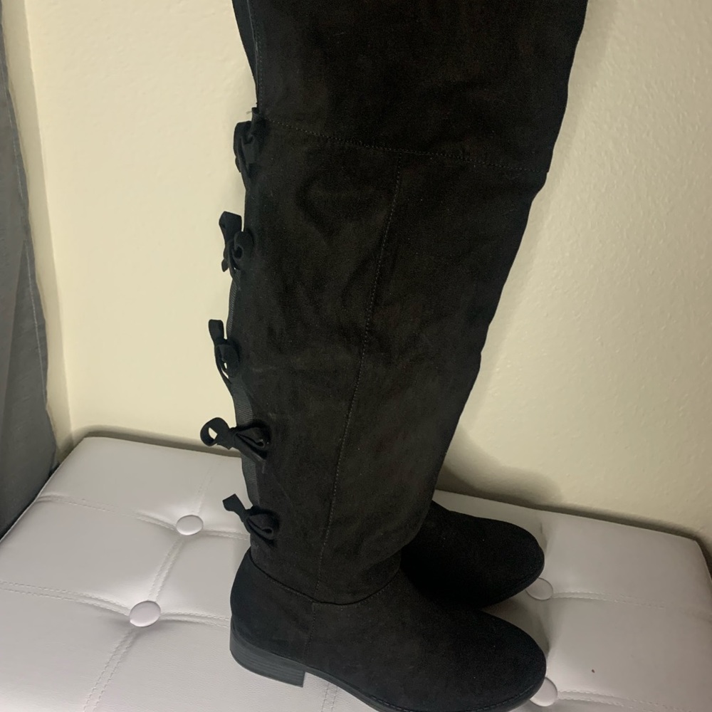 Black over the knee bow tie boots